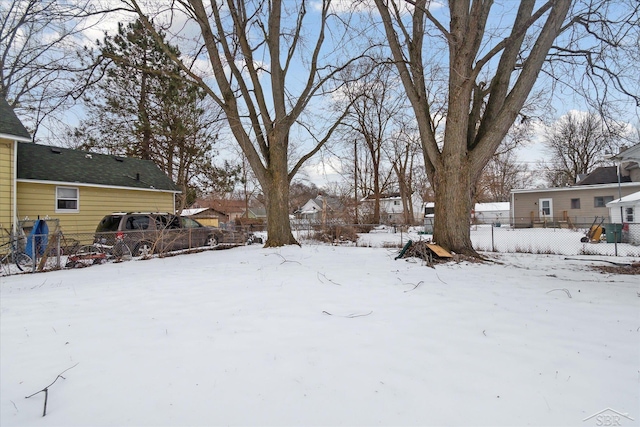 view of yard covered in snow