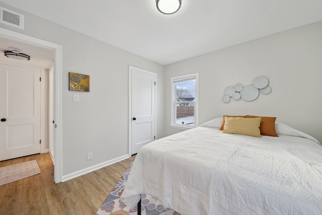 bedroom featuring light hardwood / wood-style floors