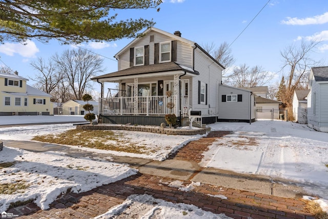 view of front of home featuring covered porch