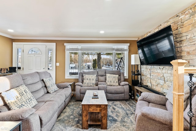 living room with ornamental molding