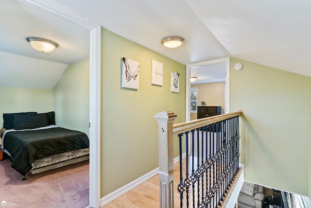 interior space featuring vaulted ceiling and hardwood / wood-style floors