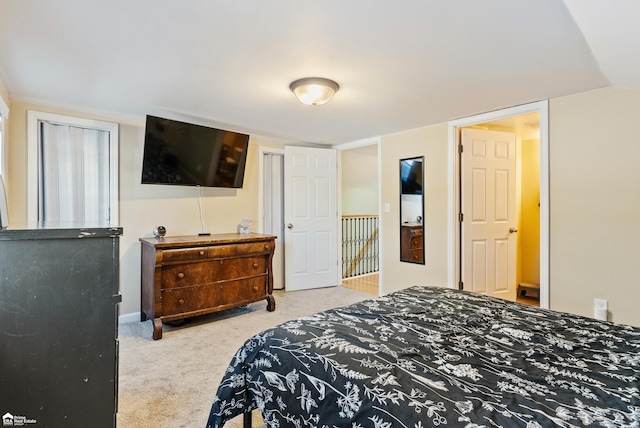 carpeted bedroom featuring lofted ceiling