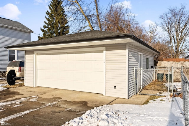 view of snow covered garage