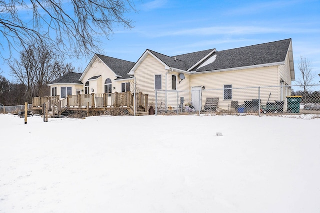 view of front of house featuring a wooden deck