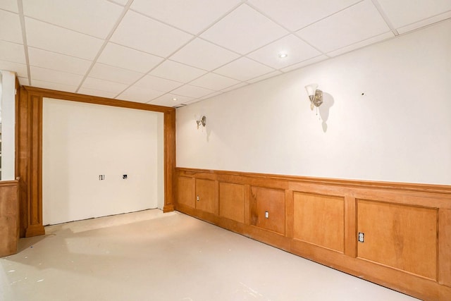 unfurnished room with a paneled ceiling