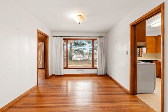 interior space featuring washer / dryer and light wood-type flooring