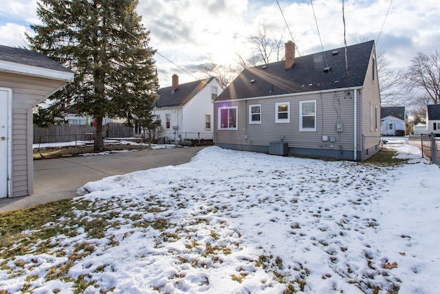 view of snow covered property