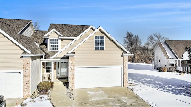 view of front of property with a garage