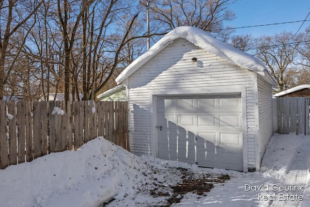 view of snow covered garage