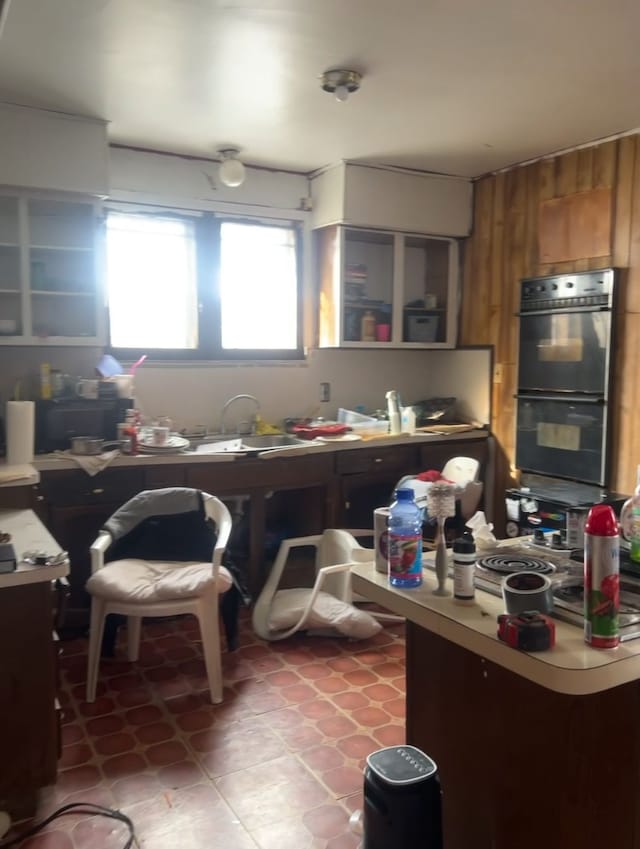 kitchen featuring sink and double oven