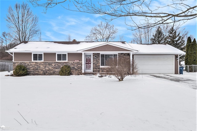 single story home with a garage