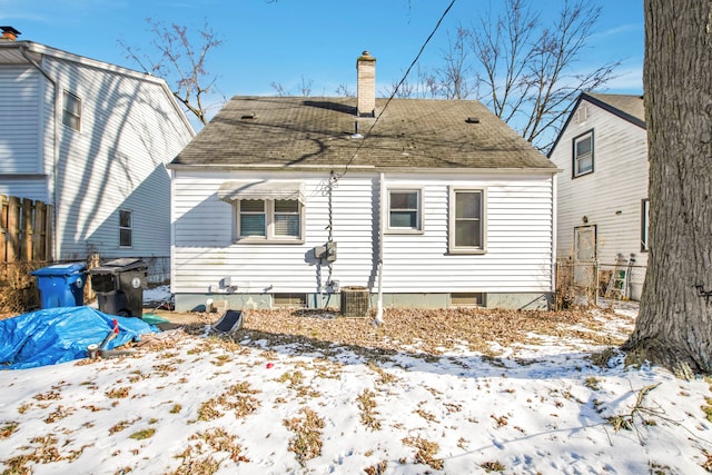 view of snow covered house