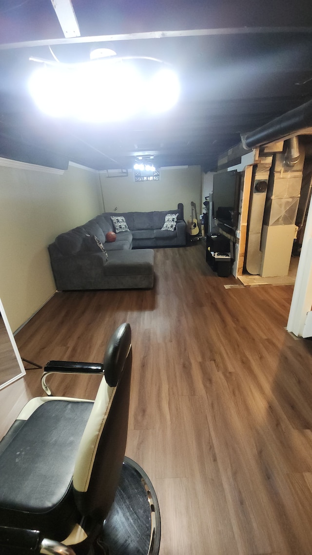 additional living space featuring hardwood / wood-style flooring