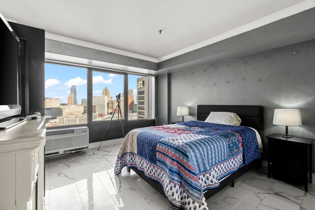 bedroom featuring a wall mounted air conditioner and access to exterior