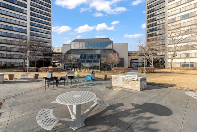 view of patio / terrace featuring exterior kitchen and grilling area