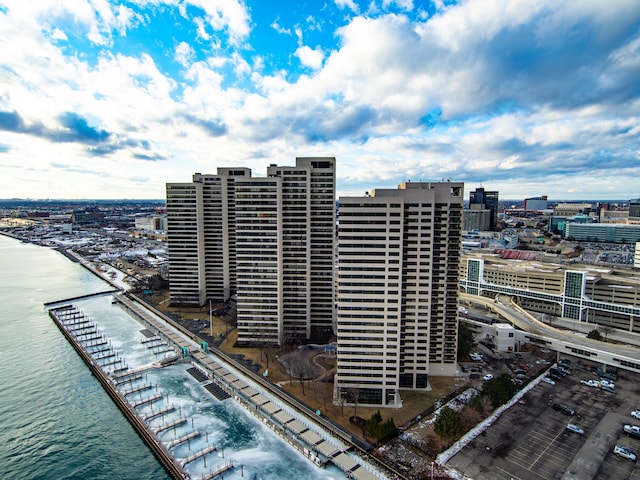 birds eye view of property featuring a water view