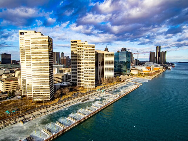 property's view of city featuring a water view