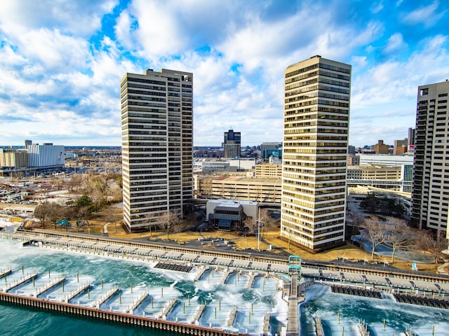 property's view of city with a water view