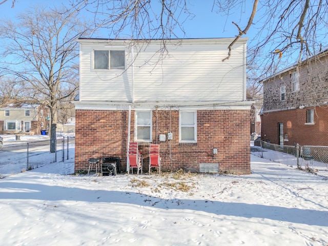 view of snow covered property