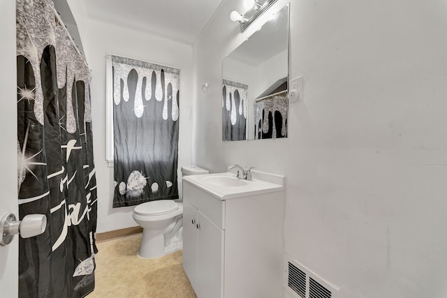 bathroom with vanity, toilet, and a shower with shower curtain