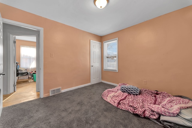 bedroom featuring carpet flooring