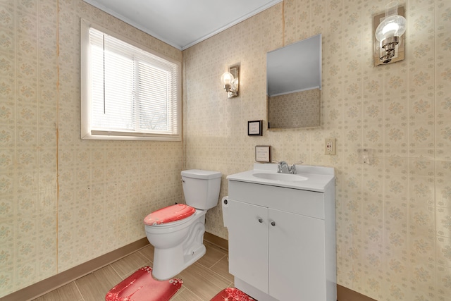 bathroom with vanity, tile patterned floors, and toilet