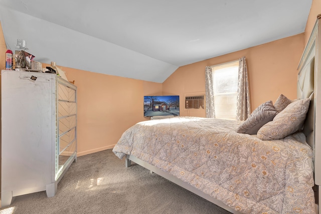 bedroom with lofted ceiling and carpet flooring