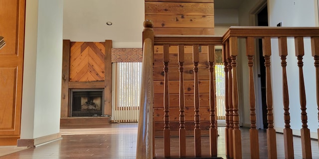 interior space with a fireplace and wood finished floors