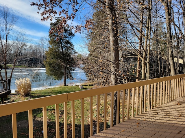 deck featuring a water view