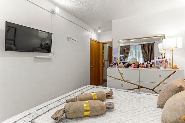 bedroom with a textured ceiling