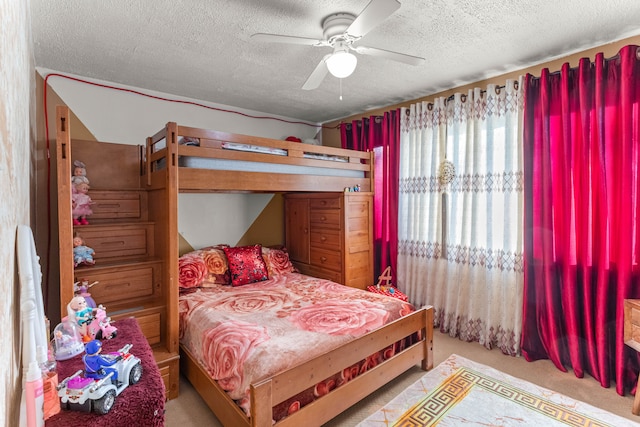 bedroom with light carpet, a textured ceiling, and ceiling fan