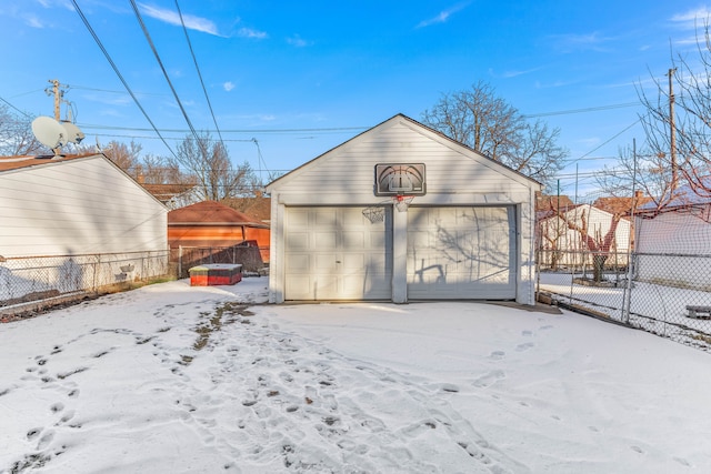 view of snow covered garage