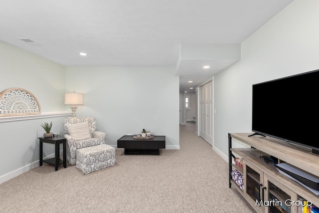 sitting room with recessed lighting, visible vents, baseboards, and carpet