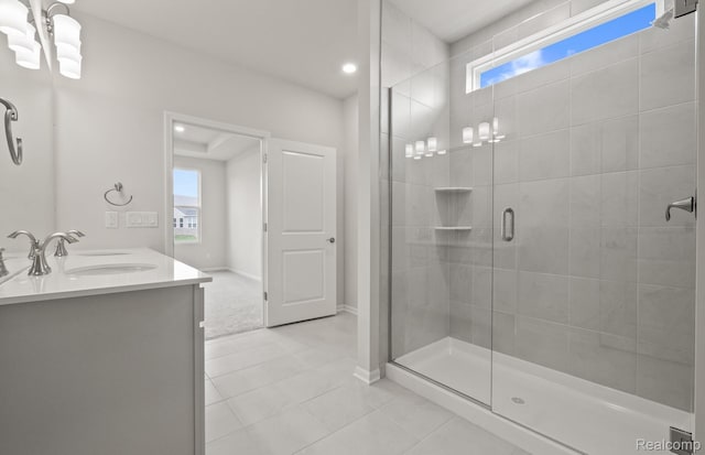 50050 Bluebell St, Canton, MI 48188 - full bath with plenty of natural light, tile patterned floors, a stall shower, double vanity, and recessed lighting