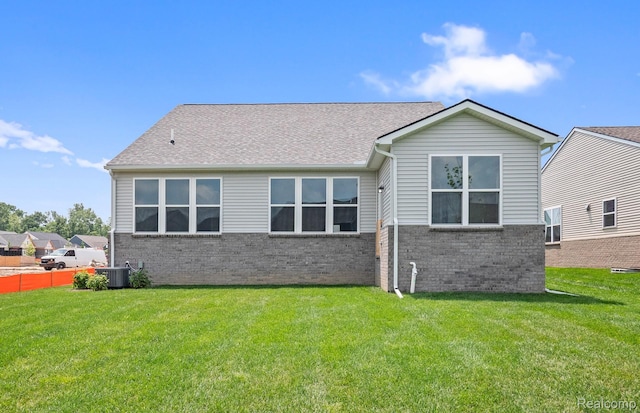50050 Bluebell St, Canton, MI 48188 - back of house with brick siding and roof with shingles