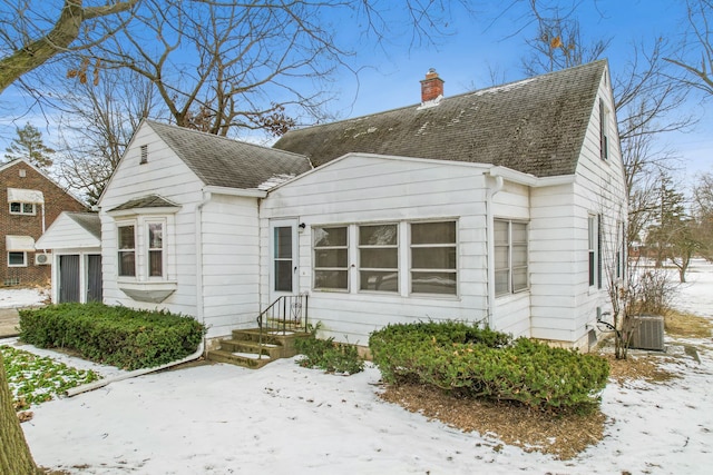 view of front of house featuring central AC unit