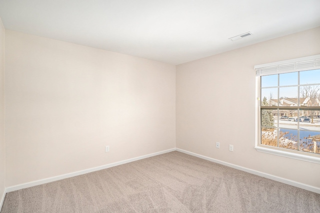 view of carpeted spare room