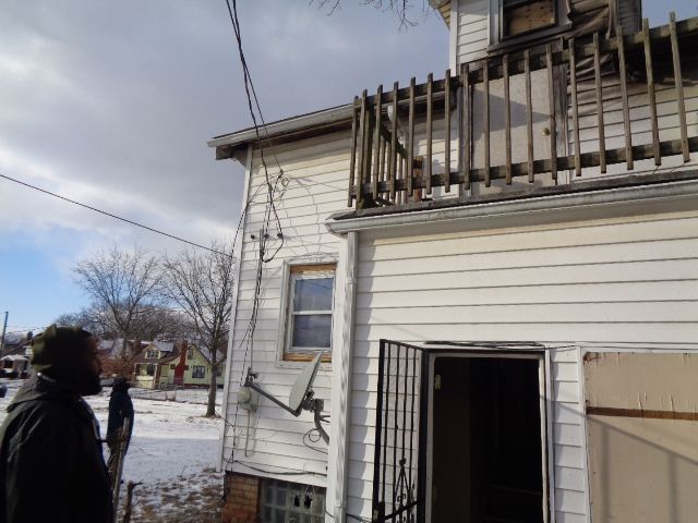 view of snowy exterior with a balcony