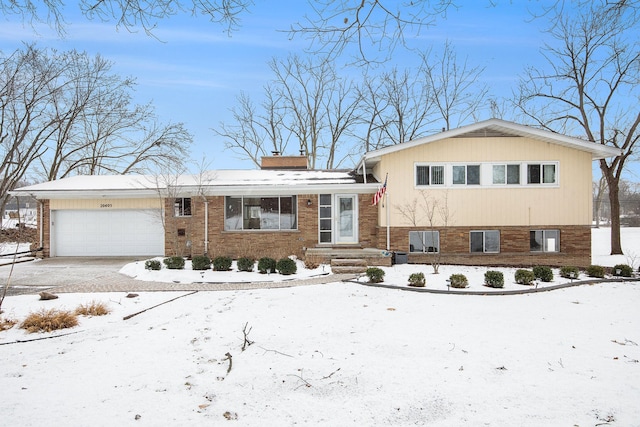 split level home featuring a garage