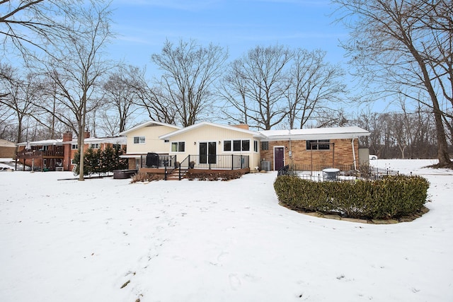 view of front of home with central AC unit