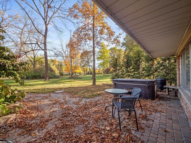 view of patio featuring a hot tub