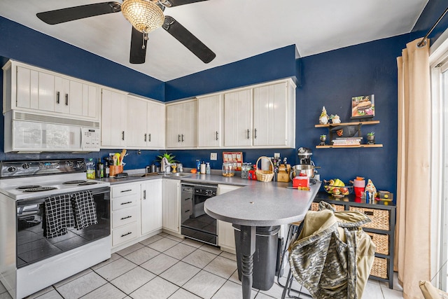 kitchen with ceiling fan, light tile patterned floors, white cabinets, and white appliances