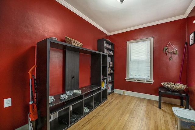 mudroom featuring ornamental molding and wood-type flooring