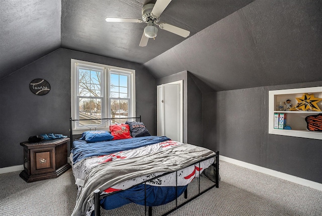 bedroom featuring ceiling fan, lofted ceiling, and carpet