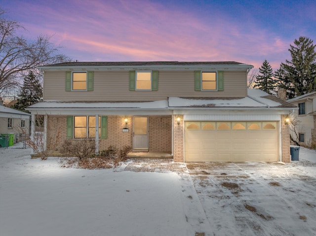 front of property featuring a garage