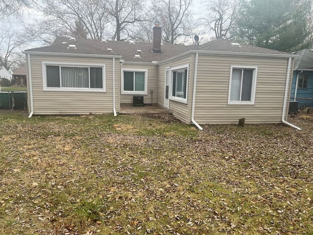 back of house with a patio