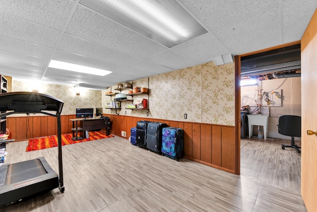 workout area with sink and a drop ceiling