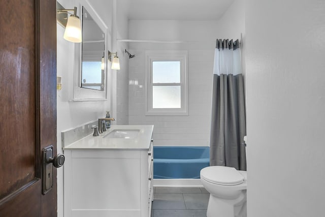 full bathroom featuring vanity, shower / tub combo, tile patterned flooring, and toilet