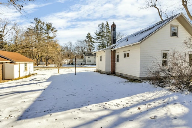 view of yard covered in snow