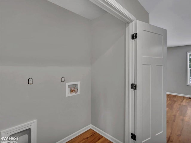 laundry area featuring hookup for a washing machine and hardwood / wood-style flooring